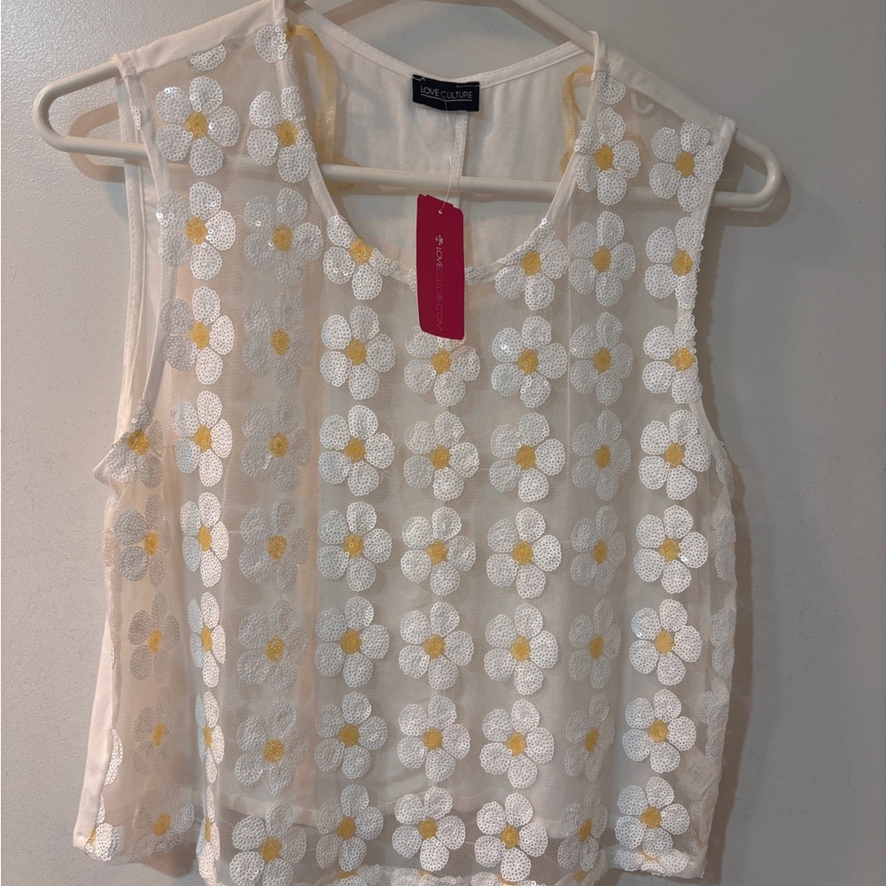 Delicate see-through sleeveless top with raised flower embellishments